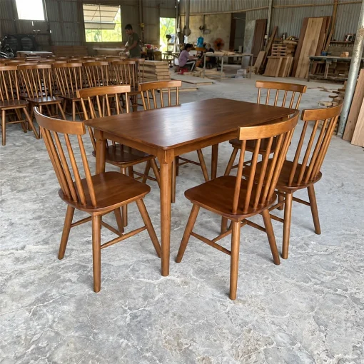 Bàn chữ nhật Pinstol QN07 màu nâu cùng ghế tựa nan đứng nhìn nghiêng