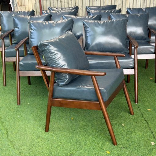 Sofa đơn Cigar gỗ cao su bọc simili | Xcom.vn Sofa đơn Cigar gỗ cao su nhìn góc nghiêng phía trước